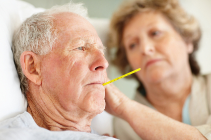 Senior man with thermometer