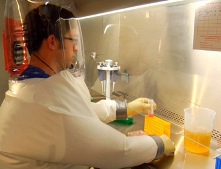 Researcher inside a biosafety level 4 laboratory.