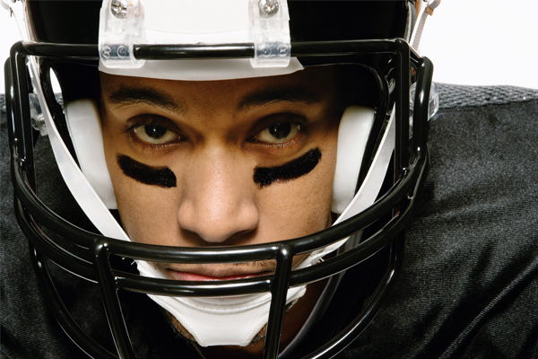 A closeup of a football player.