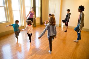 kids doing yoga in group class