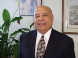 District Director, Wilfredo J. Gonzalez