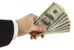 hand giving money