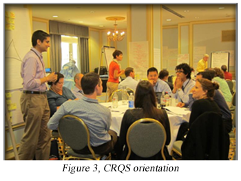 People sitting at a conference, CRQS Orientation