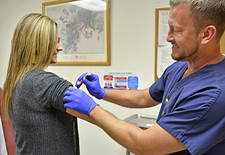 Doctor giving a flu shot