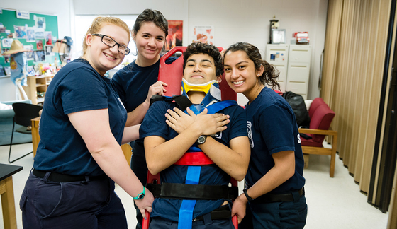 Students practicing emergency medical training