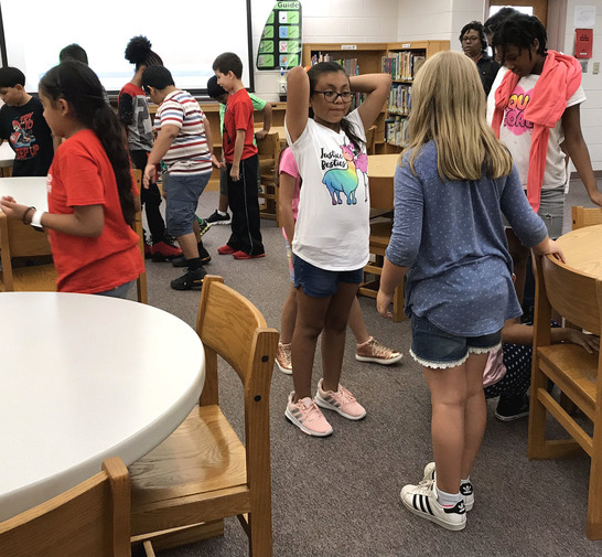 Photo of students in the library