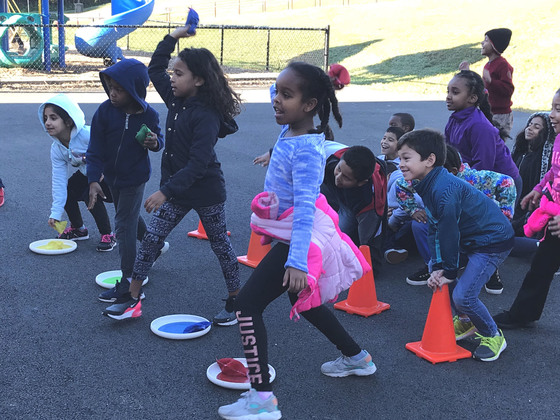 Picture of students throwing bean bags