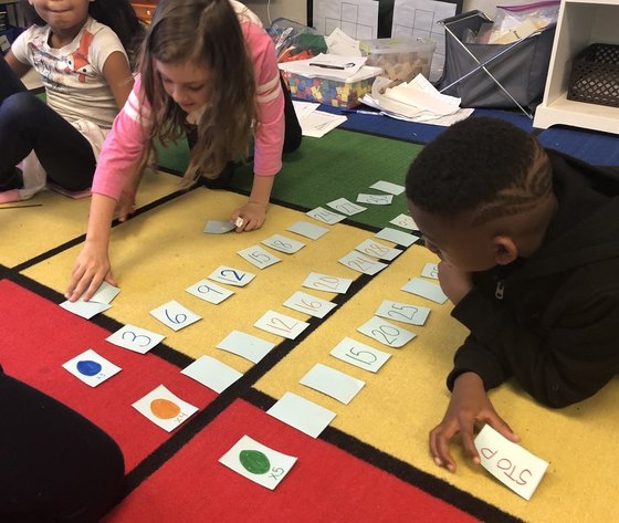 Photo of students playing a math game