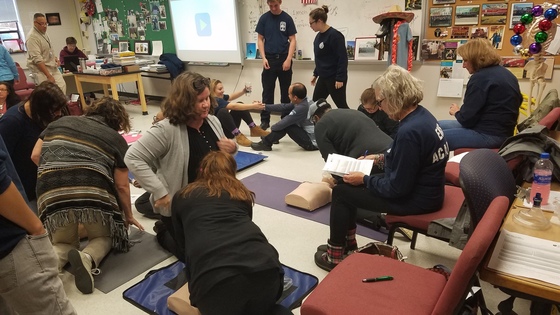 Picture of teachers and students at CPR class
