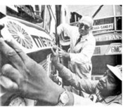 man applying Metro logo on bus