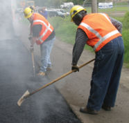 Workers fix a road in unincorporated King County.