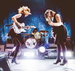 Sleater-Kinney performing