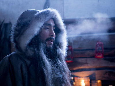 Ishmael Angaluuk Hope in the film Blue Frontier. His breath is visible in the cold air.