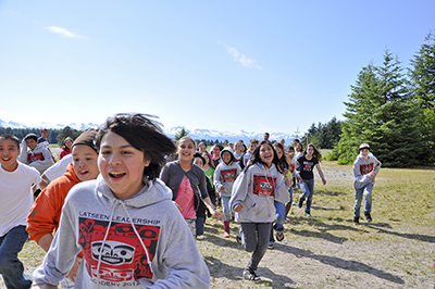 smiling kids running