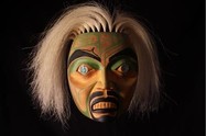 mask with black and jade accents