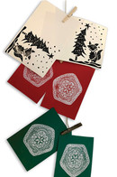holiday printmaking examples with fox and tree and snowflake patterns