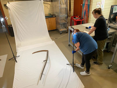 Kodiak History Museum workers are taking digital images of items in the museum’s collection.