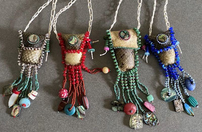 four beaded pouches