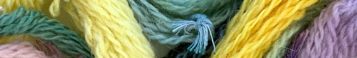 a swirl of yarns showing different natural dyes