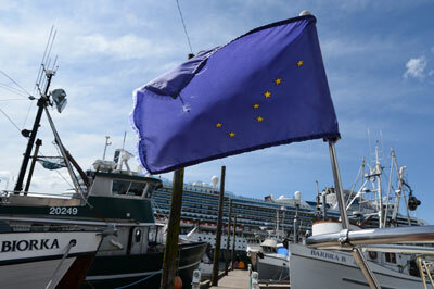 The Alaska flag flies from the bow of a boat in one of Ketchikan, Alaska’s small-boat harbors