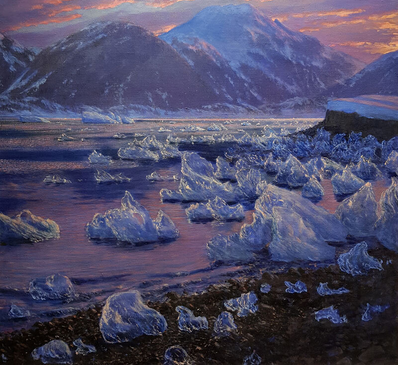 sunset colors, glistening ice chunks in water, mountains in background