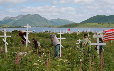 The remains of Anastasia Ashouwak were brought from Carlisle to this grave yard in Old Harbor, Alaska 121 years after she died