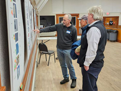 Gary Wolf discusses design concepts of the new Palmer Public Library during an open house event.