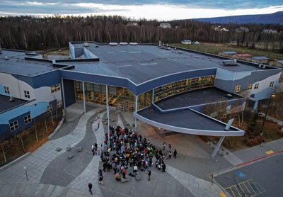 aerial view of students walking out of class at Mat-Su Career & Technical High School in Wasilla in protest