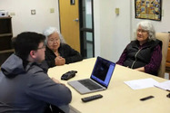 Dehrich Chya, the Alutiiq Museum’s Language and Living Culture director, sits with Elders at a weekly session in Kodiak 