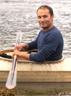 Lou Logan in kayak
