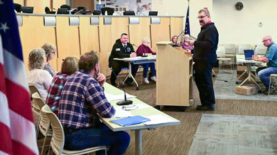 Matanuska-Susitna Borough Attorney Nicholas Spiropoulos speaks to members of the borough's citizens' library advisory panel