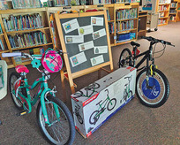 These two bicycles will be given away as part of the summer reading challenge at the library. Stop by the library to find out how to win a new bike!