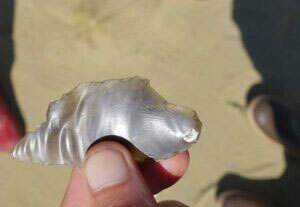 Ned Rozell found this obsidian flake at an archaeological site in the Nogahabara Dunes.