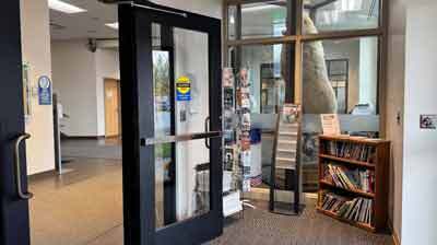 An entryway leading to the lobby of the borough administration building in Palmer