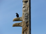 raven on a totem pole