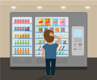 Student trying to find a healthy snack at a vending machine