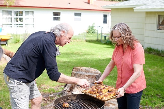 Alaska Diabetes Prevention Program Improves Melanie's Health, shown here making a health dinner with her husband