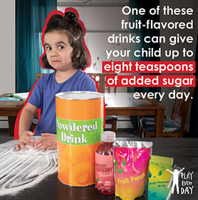 Image of little girl playing with a pile of sugar on the counter next to powdered drink mixes, some have as much as 8 teaspoons of sugar per drink. 