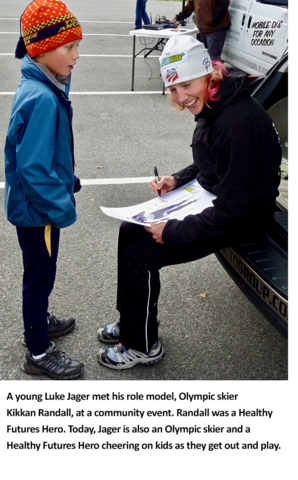 A young Luke Jager met his role model, Olympic skier Kikkan Randall, at a community event.