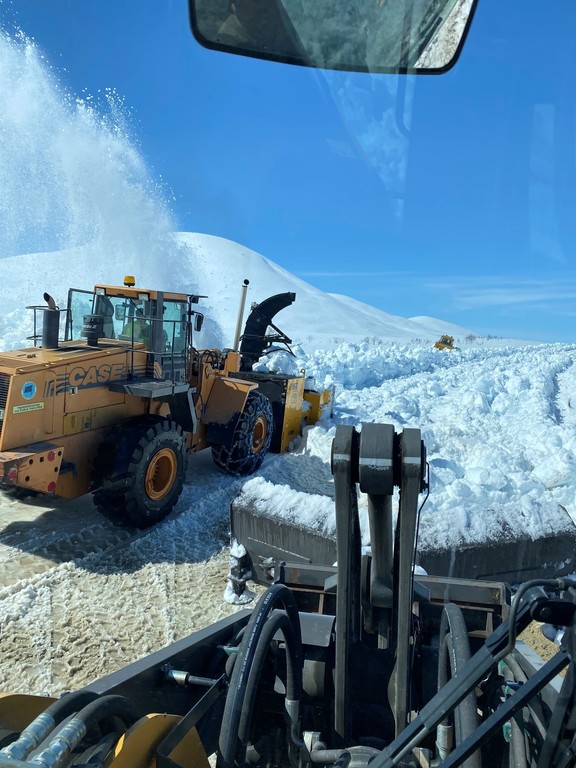 The Paxson crew works to open the road on May 12