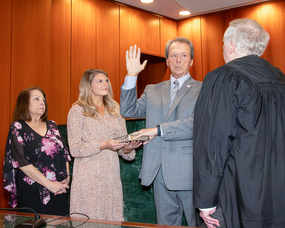 image of district 5 Commissioner Bolin being sworn in on Monday