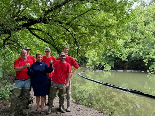 Commissioner Scales with members of the Osprey Initiative team