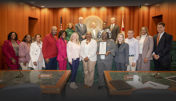 Karen McGlond being recognized by the County Commission for 30 years of service