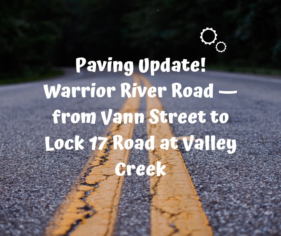 close up image of pavement with Warrior River Road Paving Update typed on it 