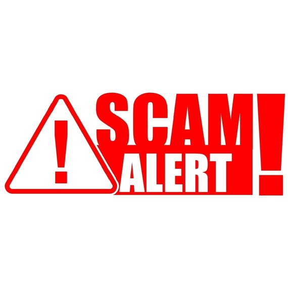 Stock image of scam alert in red