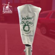 Free metered parking downtown. Image of a bag on a parking meter. 