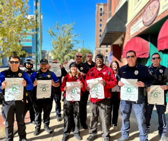 Photo of police officers with parking meter bags