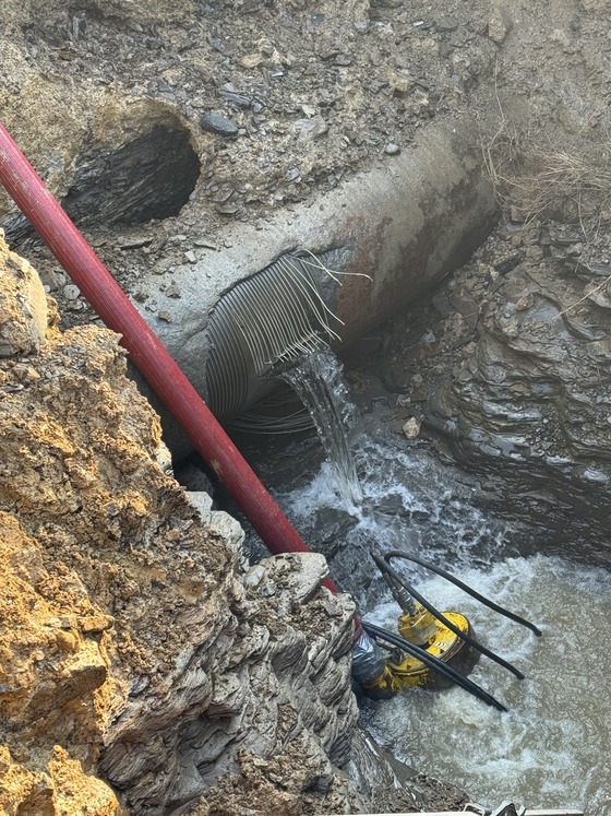 Crews repairing a 24-inch water main