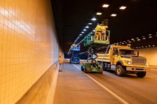 ADOT crews work get a lift while changing out lighting in the I-10 Deck Park Tunnel in Phoenix