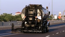 Tanker truck used to apply sealant treatment to extend life of asphalt pavement (ADOT file photo)